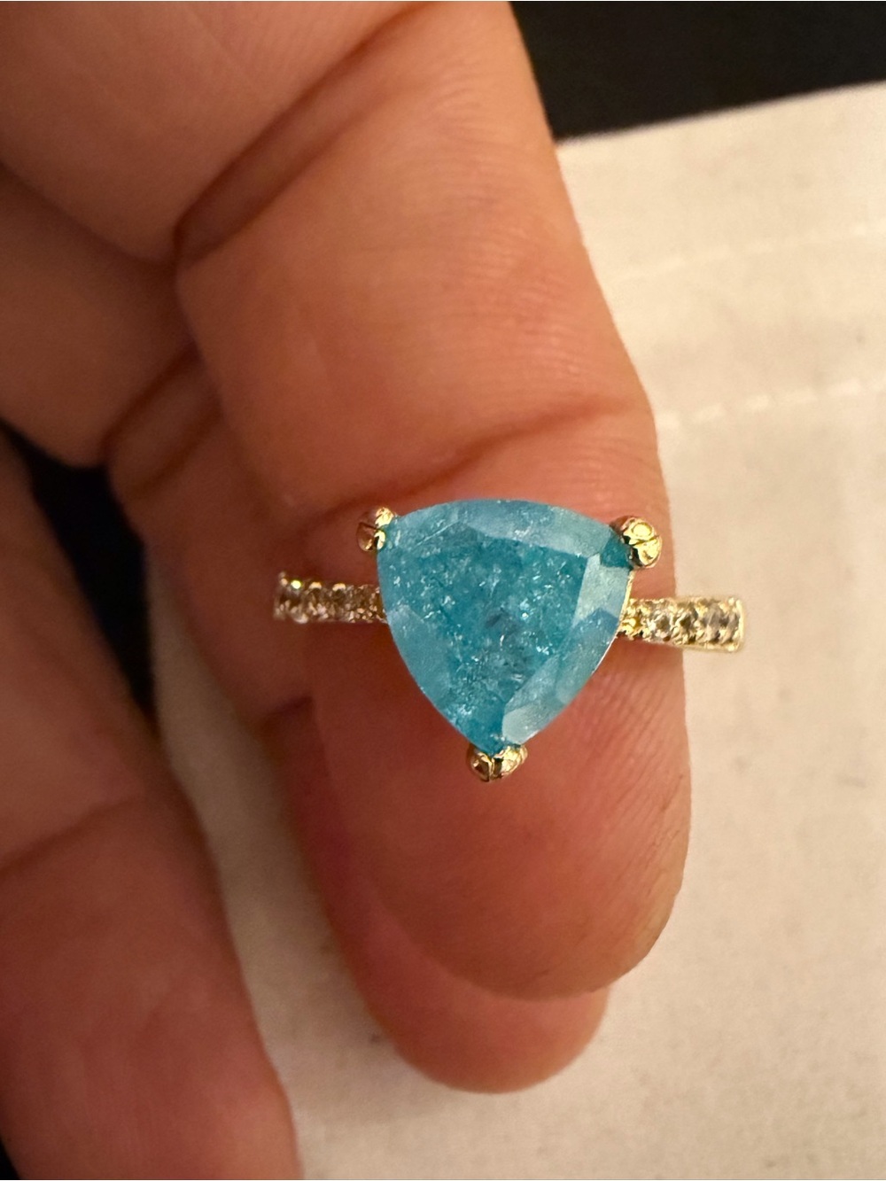 Gold Ring with Triangular Blue Gemstone and Pavé Band